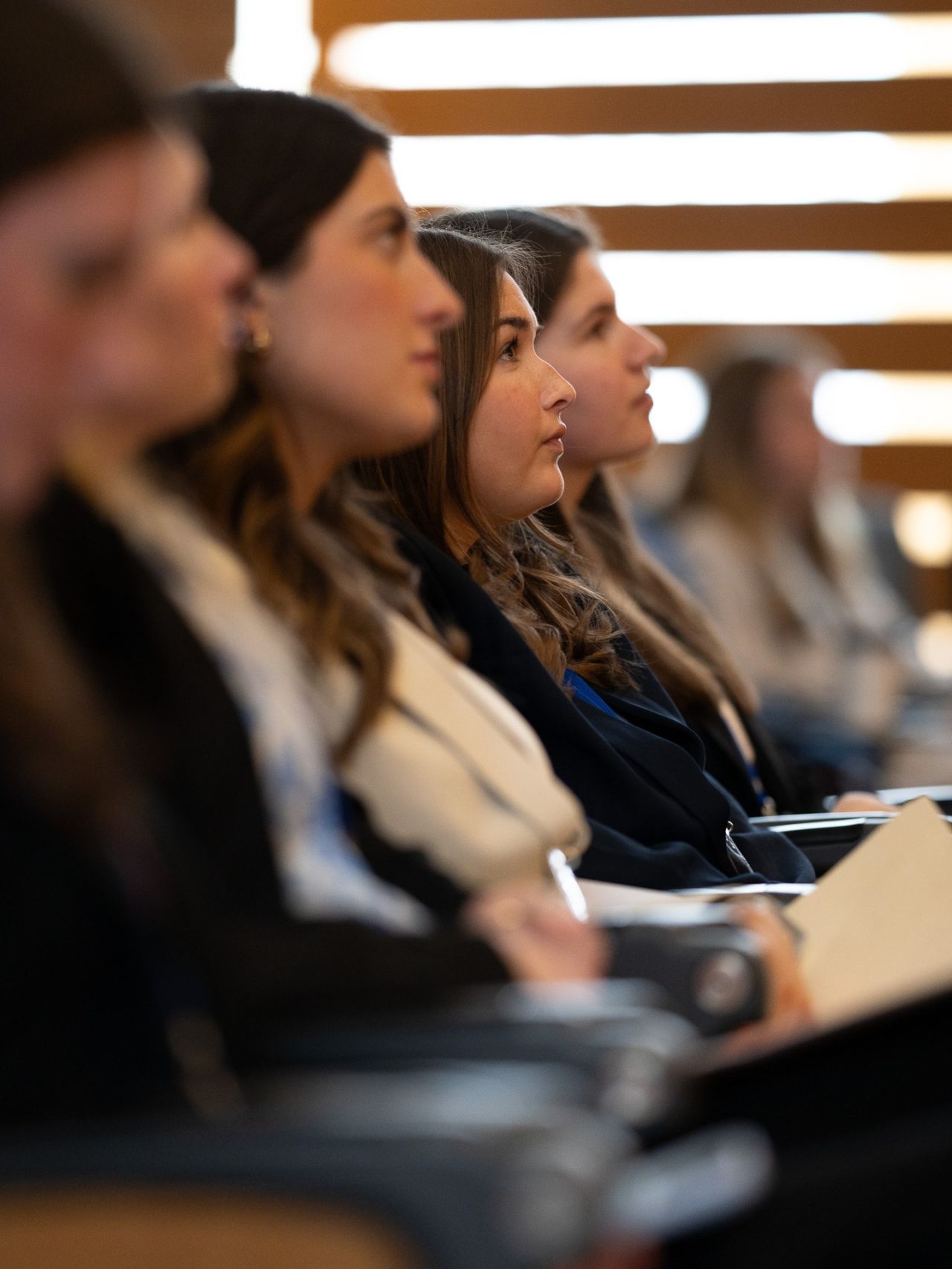 Audience members at a MACSMAC event